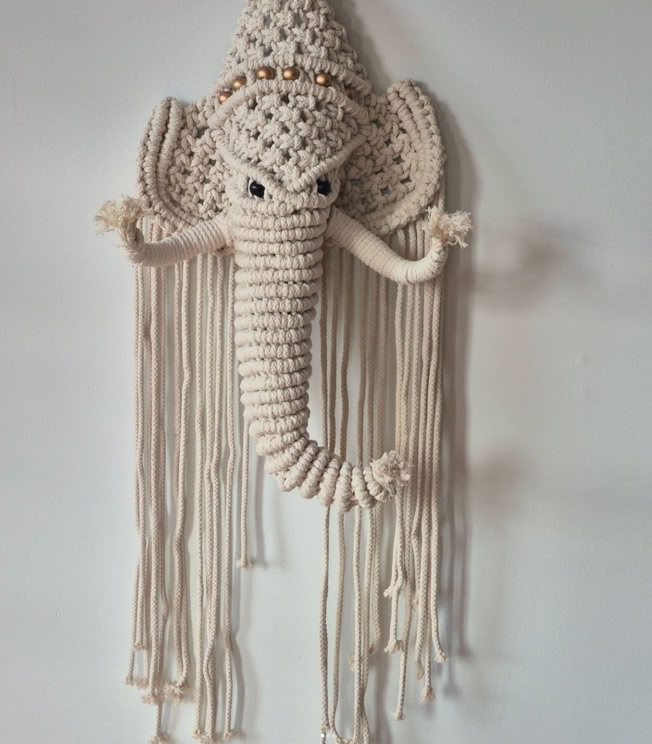A shiek detailed macrame black shoulder bag with decorative heart patterns and inside bag lining